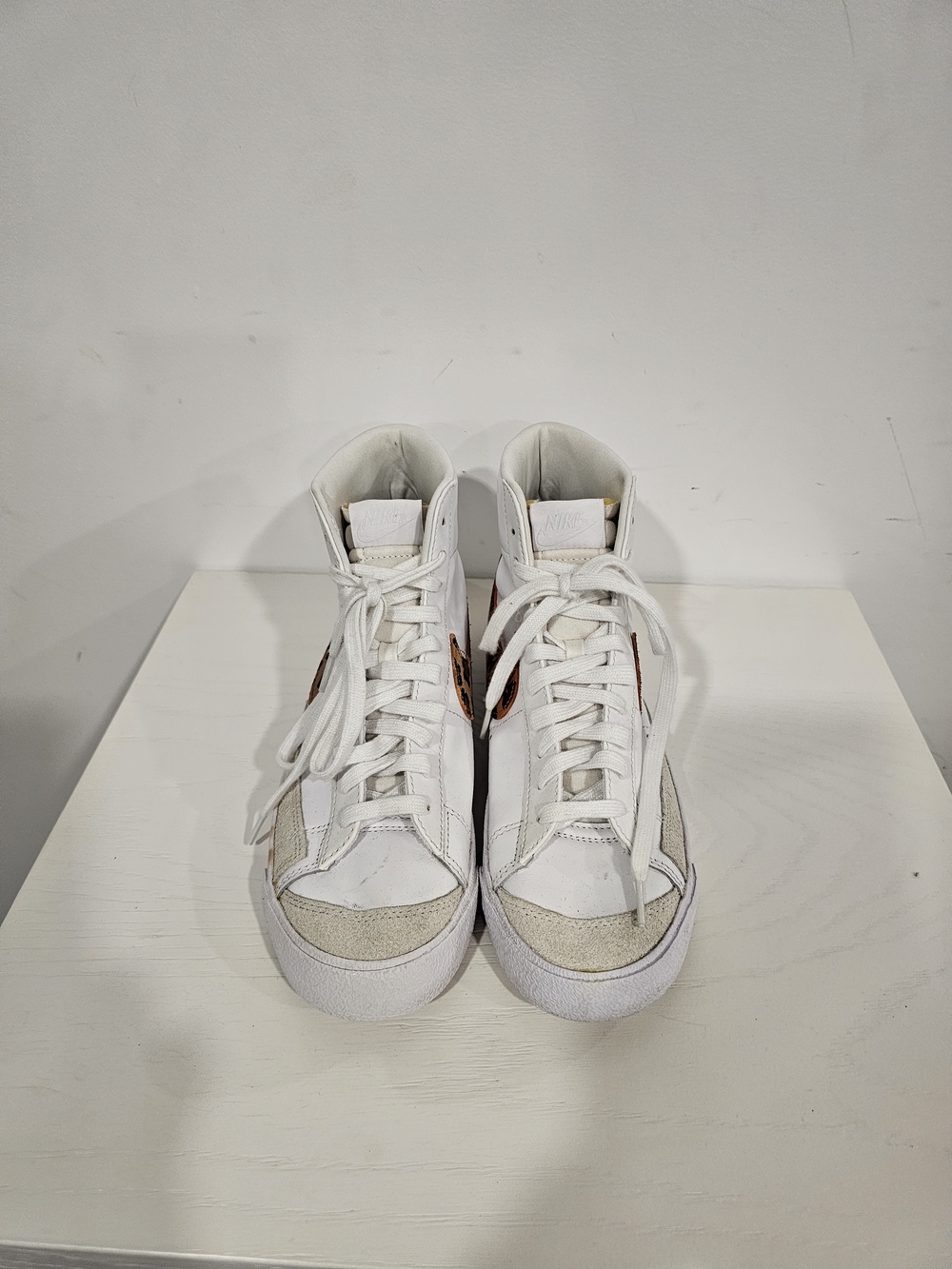 Nike White High-Top Sneakers with Leopard Print Logo